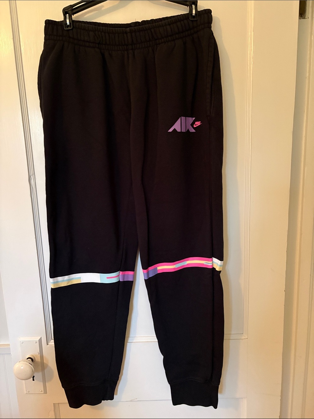 Nike Men’s Black Jogger Sweatpants with Pink & Multicolor Stripe Accents